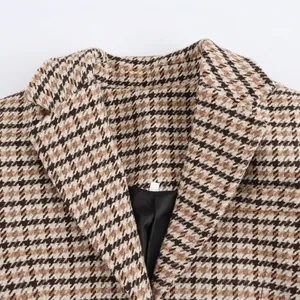 Classic checkered wool coat with houndstooth pattern and elegant notched lapel collar