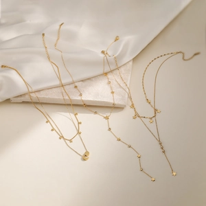 18K gold plated layered necklace with sparkling zircon star and moon tassels
