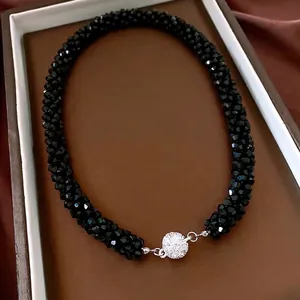 Elegant beaded glass necklace with a sparkling pavé crystal ball magnetic clasp
