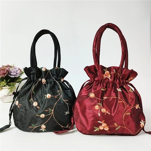 Ethnic style embroidered satin bucket bags in black and wine red with drawstring