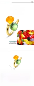 Detail view of S925 silver gold-plated ring showing 8x8mm square yellow and green crystals