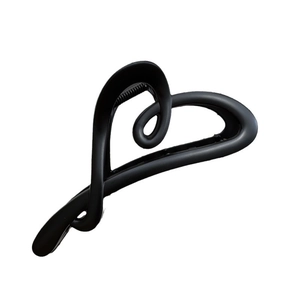 Elegant matte black heart hair claw clip for women on a clean white background