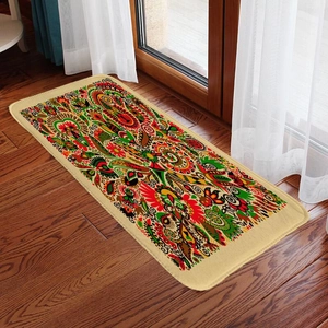 Ethnic bohemian rectangle floor mat with colorful geometric patterns on wood floor
