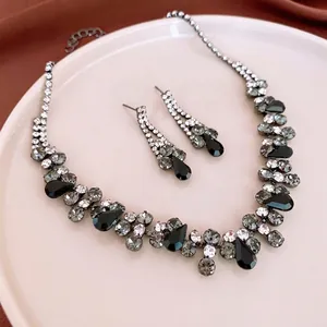 Elegant rhinestone water drop necklace and earring set in a vintage luxury style