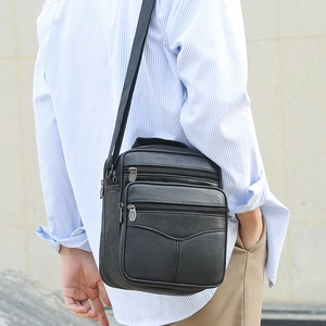 Large capacity black lychee pattern leather crossbody bag for men with multi-layer zippers