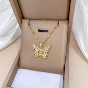 Elegant gold butterfly pendant necklace with zircon and Madonna portrait on silk