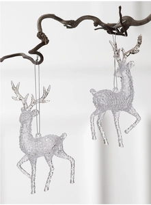 Detail of transparent acrylic reindeer ornaments with silver glitter accents on branches