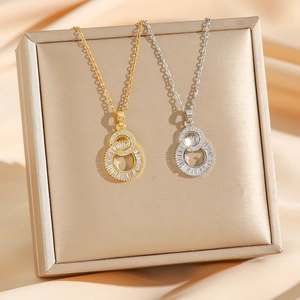 Luxurious figure-eight double ring necklace set in gold and silver with sparkling zircon