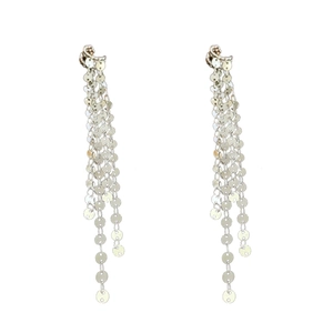 Silver fringe tassel earrings with shimmering metal sequins on a minimalist white background