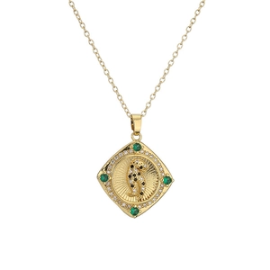 Golden necklace with leopard square pendant featuring green gems and cubic zirconia stones