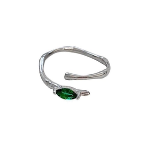 Detail of 925 silver bamboo ring with green marquise gemstone leaf on white background