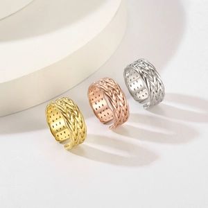 Tre anelli aperti a trama intrecciata minimalisti in oro, oro rosa e argento