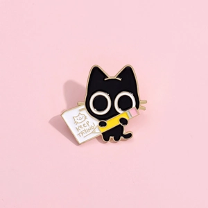 Cartoon black cat enamel brooch badge with Keep Trying message and yellow pencil