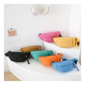 Detailed display of seven colorful nylon kids' waist bags with woven zipper pulls