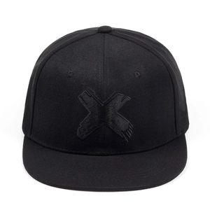Close-up detail of black punk hip-hop flat brim cap featuring 3D embroidered X pattern