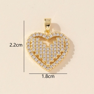 Golden heart pendant with clear crystals and 2.2cm x 1.8cm size measurements