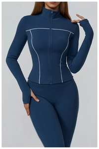 Detail of zip-up sports jacket with white contrast stitching and thumbhole cuffs