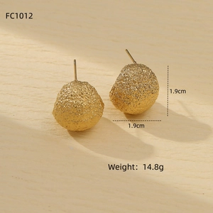 Macro shot of gold stainless steel earrings with frosted pleated texture and 1.9cm size