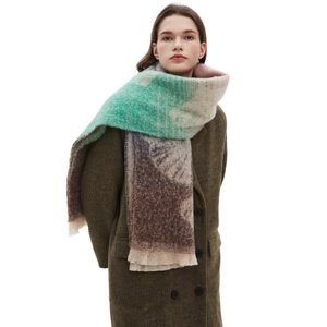 Women's autumn winter boucle yarn scarf with ginkgo leaf pattern and tassels