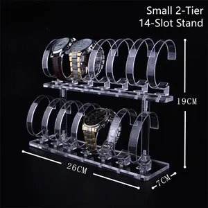 Double-tier clear acrylic watch display stand with 14 C-rings on black background
