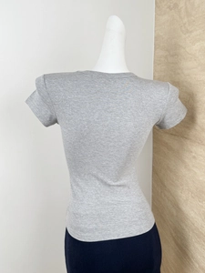 Slim fit gray short sleeve t-shirt showing rear view and fine knit fabric texture