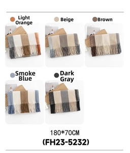 Detailed selection of five color plaid scarves with elegant long fringe and soft texture