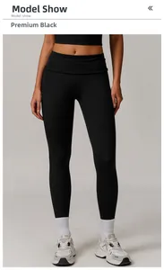 Détail du legging de yoga taille haute noir premium avec ceinture à revers élégante