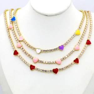 Three-piece gold tennis chain set with colorful enamel heart pendants and zircon stones