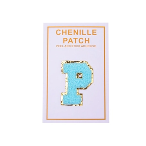 Close-up of sky blue chenille letter P patch with gold glitter edges and peel-off adhesive
