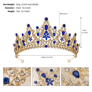 Detailed view of luxury gold bridal tiara with blue teardrop gems and clear rhinestones