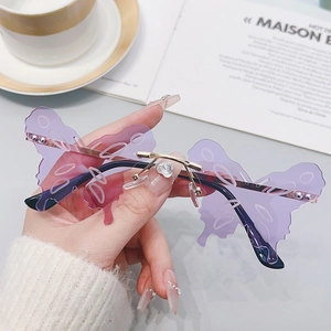 Fashionable butterfly shaped rimless sunglasses with purple lenses and gold metal bridge