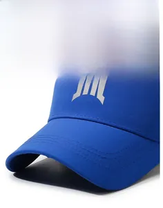 Detail of blue baseball cap showing stiff brim with reinforced stitching and reflective logo
