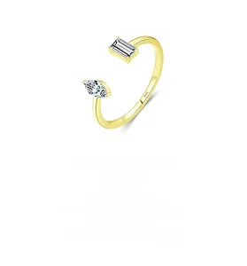Macro shot of S925 hallmark on gold-plated ring with rectangular and marquise stones