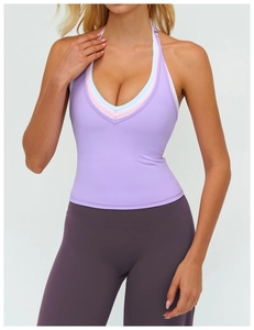 Close-up of V-neck halter sports bra with three-layer pastel trim and purple stretch fabric