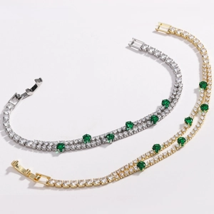 Detail of 4mm double-row tennis bracelet with green and white cubic zirconia stones