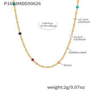 Detailed view of a gold stainless steel necklace with colorful zircon beads and measurements