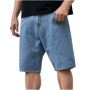 Detail view of light blue denim shorts for men with vintage wash and straight leg cut