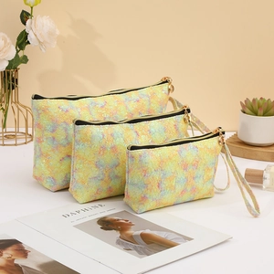 Three-piece set of shimmering glitter lace cosmetic bags in yellow green pink gradient
