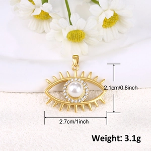 Detail of evil eye pendant with measurements: 2.7cm wide, 2.1cm high, weighing 3.1g