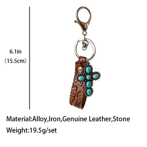 Vintage embossed leather keychain with western turquoise cross and squash blossom pendant