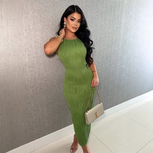 Detail of the grass green bodycon dress featuring textured 3D wavy ripple fabric