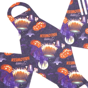 Flat lay of purple Halloween gift bag showing pumpkin and ghost print details