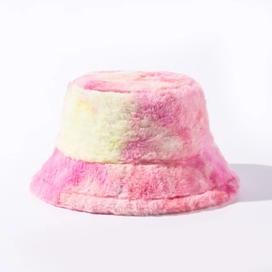 Tie-dye fluffy bucket hat in pastel pink, yellow and purple faux fur for winter warmth