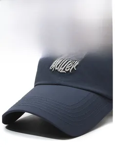 Detail of navy blue baseball cap featuring 3D matter embroidery and a curved brim