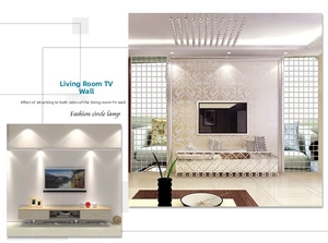 Detail of self-adhesive mini square acrylic mirror wall tiles on a living room TV wall