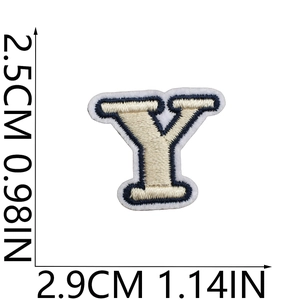 Detailed view of cream and navy embroidered letter Y patch with precise size measurements