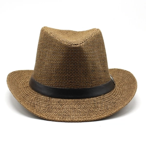 Classic tan straw western cowboy hat with black leather band and silver buckle