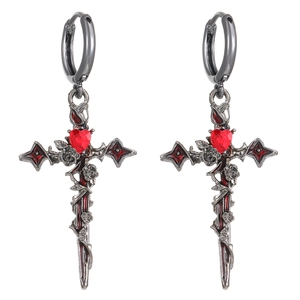 Gothic silver cross earrings with red heart gem and rose thorns on white background