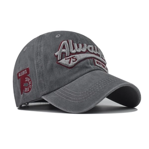 Detailed side view of 3D embroidered Always 75 on washed cotton baseball cap