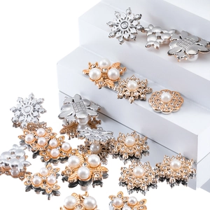 Detail showing artificial pearls and rhinestones on gold alloy DIY jewelry parts